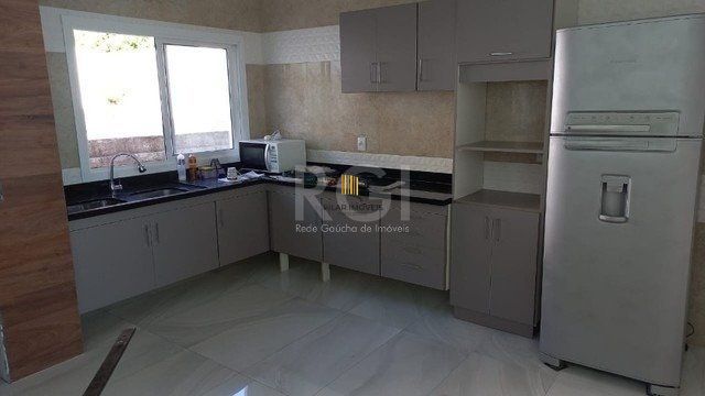 Casa 4 dormitórios no bairro Nonoai