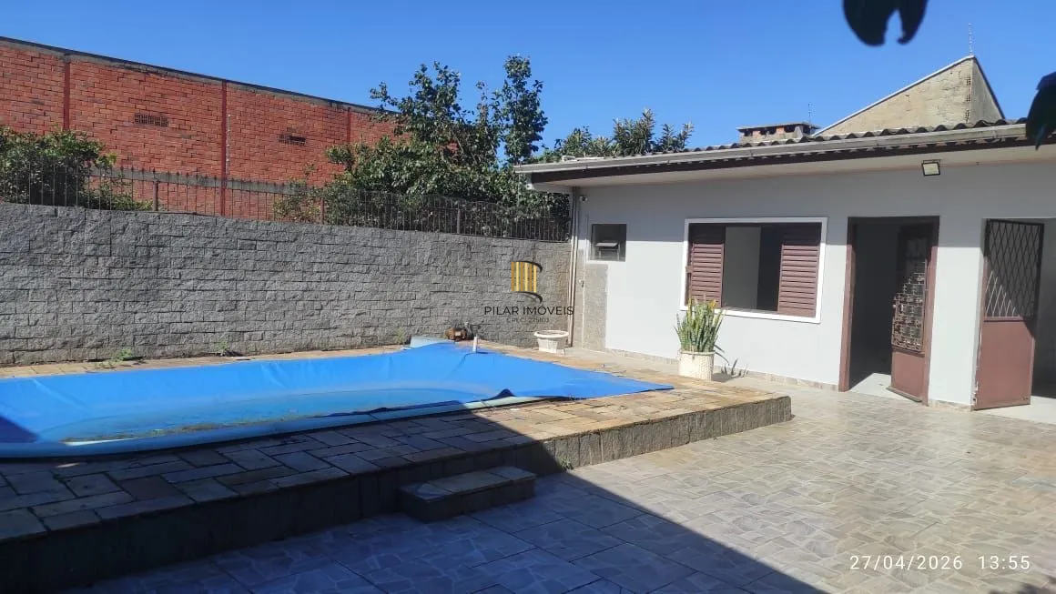 Casa com piscina e salão de festas a venda Canoas / 3 Dormitórios