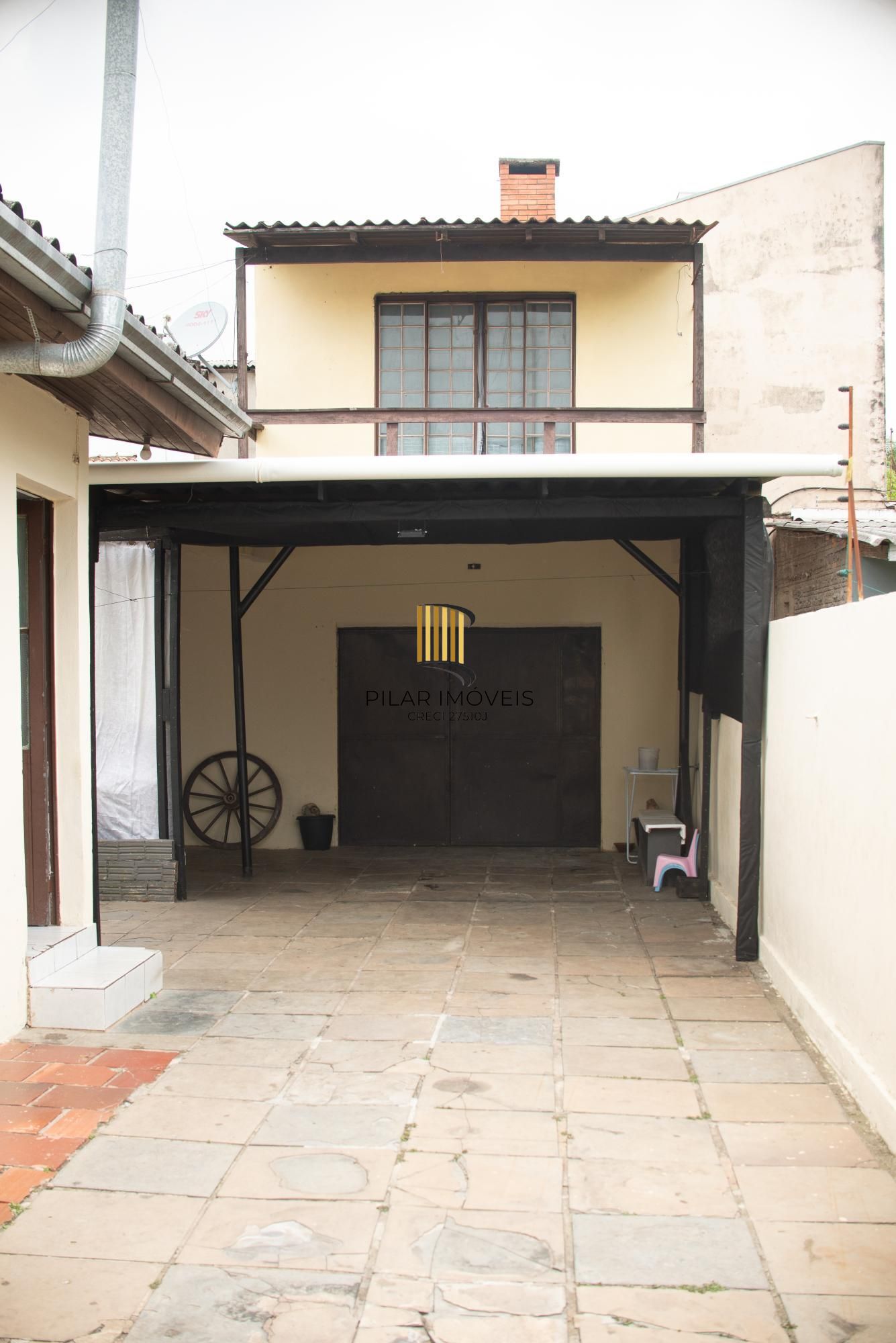 Casa de três dormitóros a venda