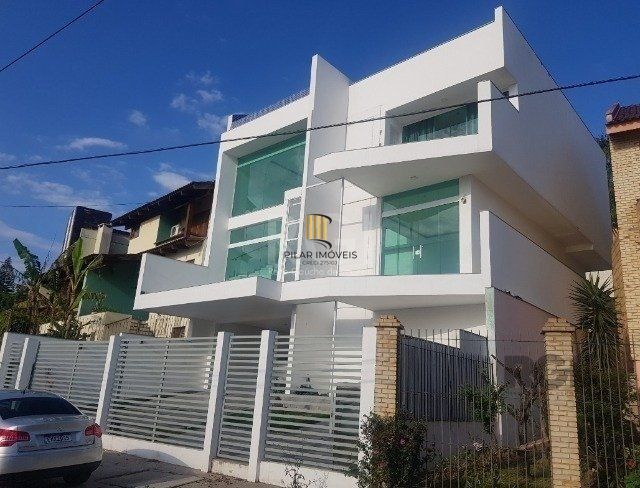Casa 4 dormitórios no bairro Nonoai - Pilar Imóveis