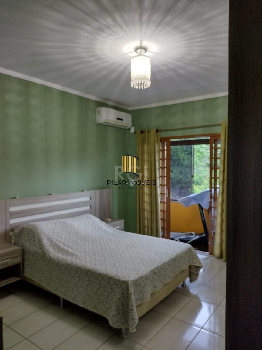 Casa para Venda - 0.18m², 2 dormitórios, sendo 2 suites, 3 vagas - Lomba do Pinheiro