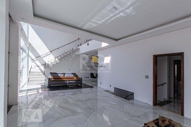 Casa 4 dormitórios no bairro Nonoai