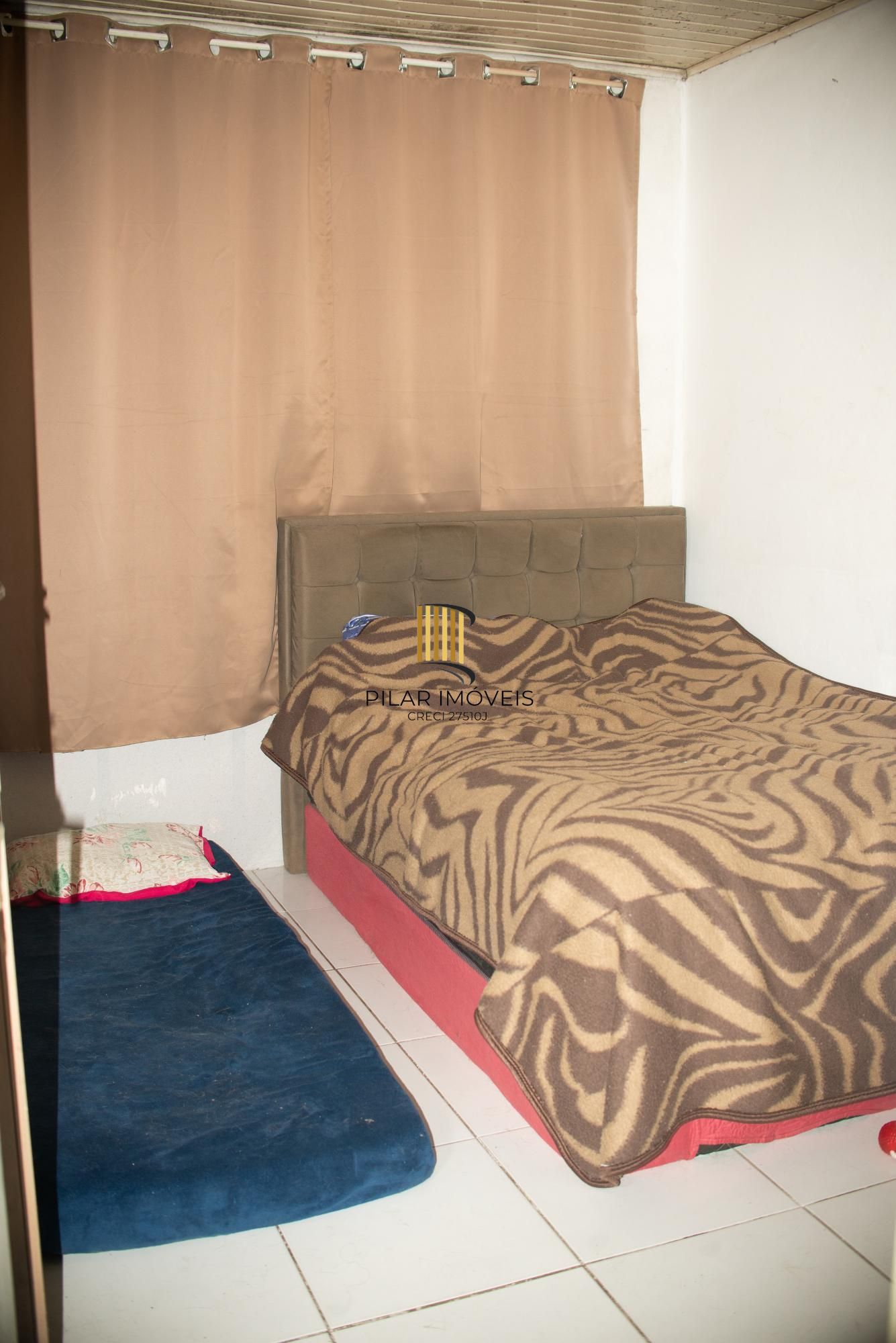 Casa de três dormitóros a venda