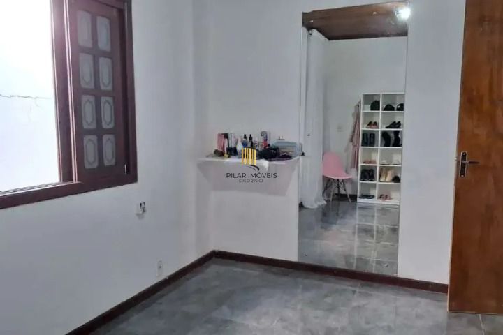 CASA A VENDA NO BAIRRO HARMONIA EM CANOAS COM 4 QUARTOS / 1 SUITE / 3 BANHEIROS / 6 VAGAS