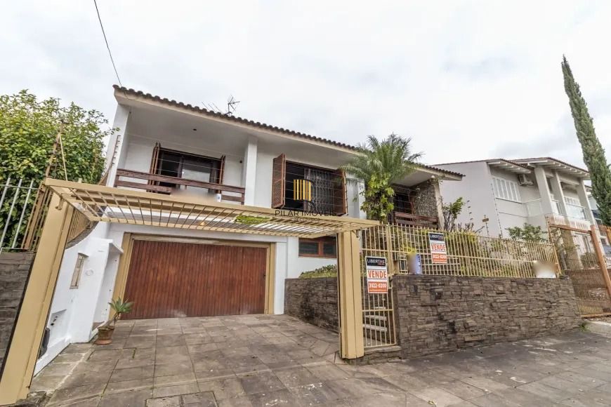 Casa / 3 Dormitórios / 1 Suíte / 3 Vagas / Churrasqueira / Piscina / Jardim Planalto / Jardim Itu / Porto Alegre / RS - Pilar Imóveis