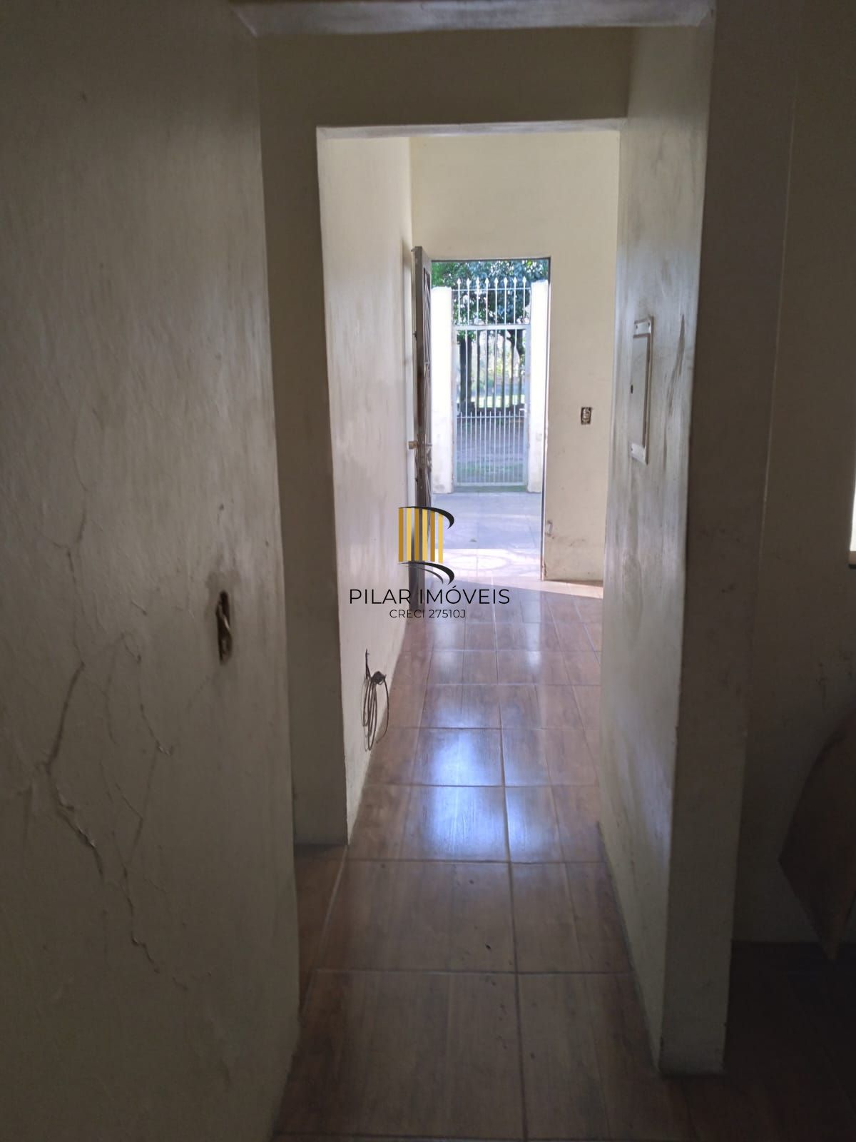 Casa com 2 dorm.  de  alvenaria em região arborizanada.