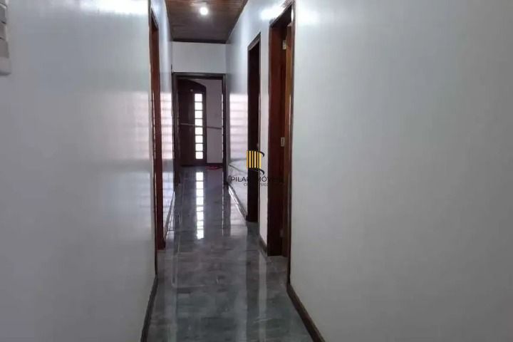CASA A VENDA NO BAIRRO HARMONIA EM CANOAS COM 4 QUARTOS / 1 SUITE / 3 BANHEIROS / 6 VAGAS