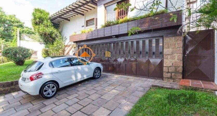 Casa 4 dormitórios no bairro Chácara das Pedras