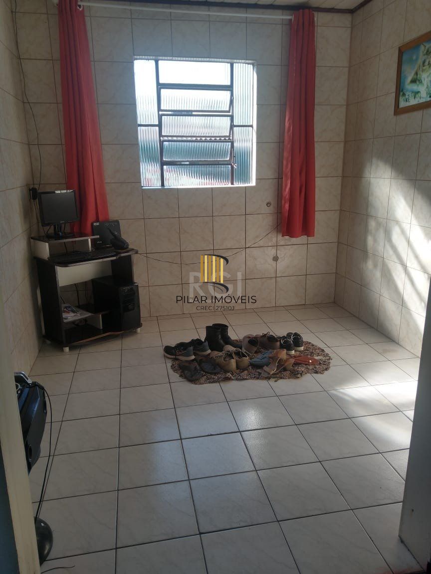 Casa 3 dormitórios no bairro São Judas Tadeu