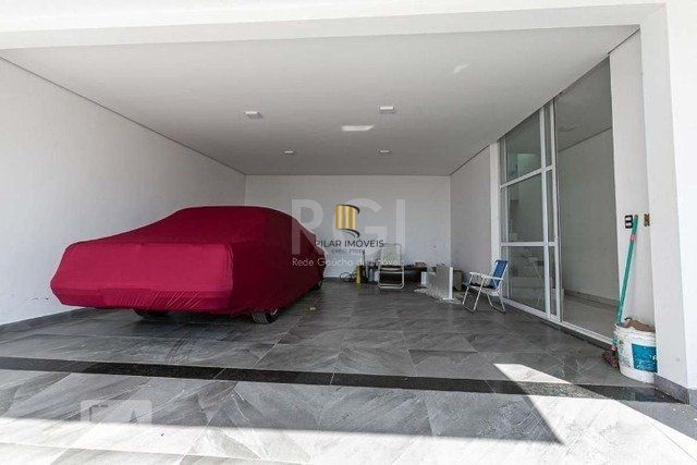 Casa 4 dormitórios no bairro Nonoai
