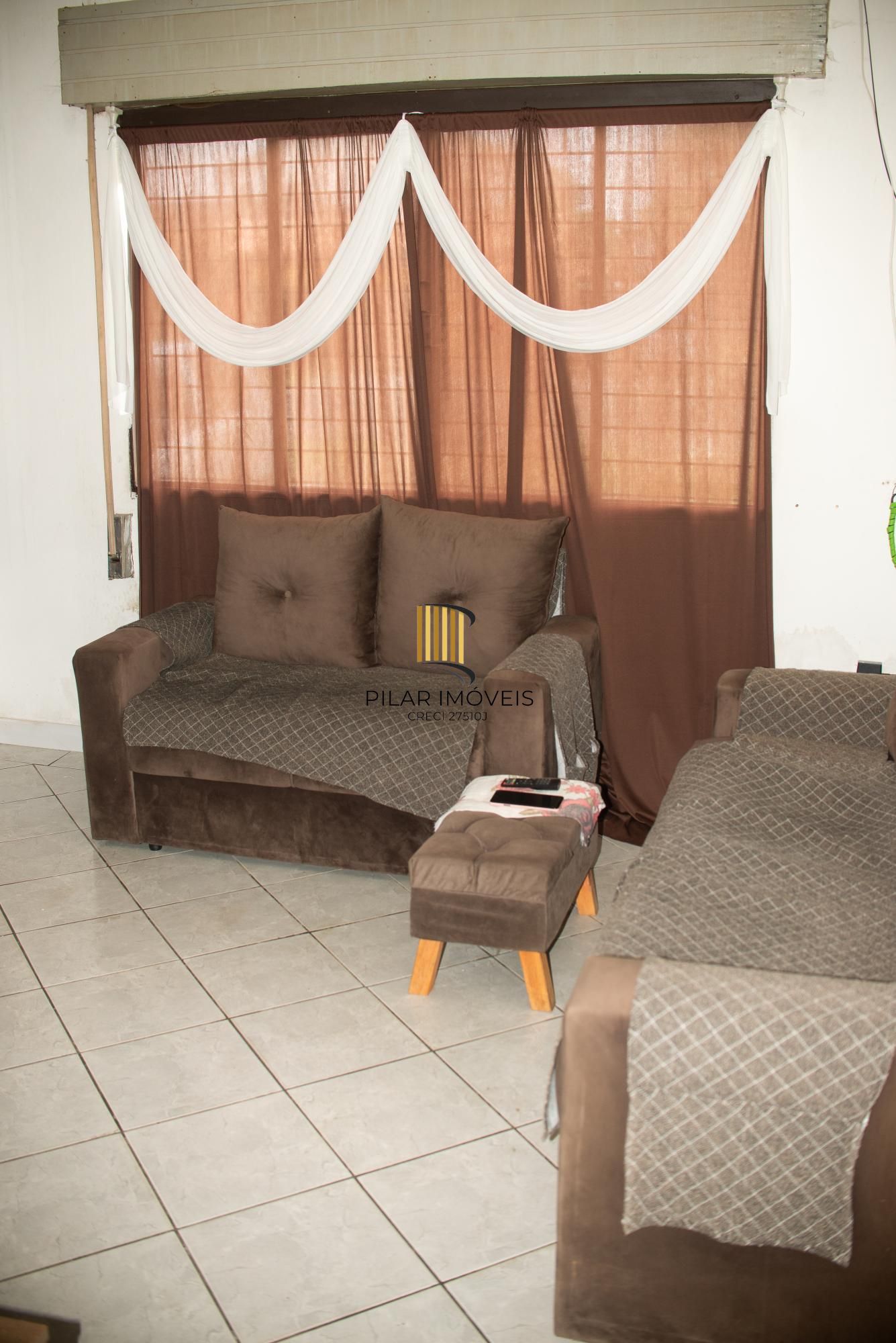 Casa de três dormitóros a venda