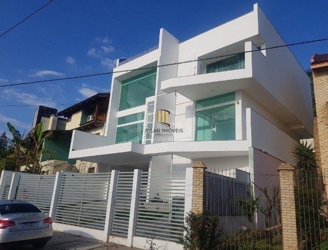 Casa 4 dormitórios no bairro Nonoai