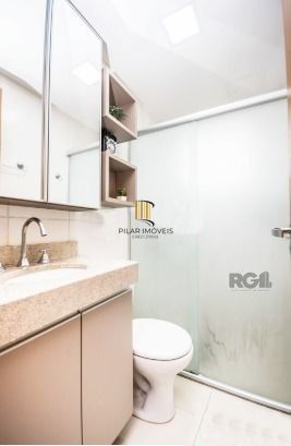 Apartamento com 2 quartos, sala, cozinha, sacada com churrasqueira e 1 vaga.