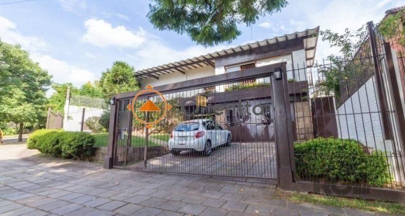 Casa 4 dormitórios no bairro Chácara das Pedras