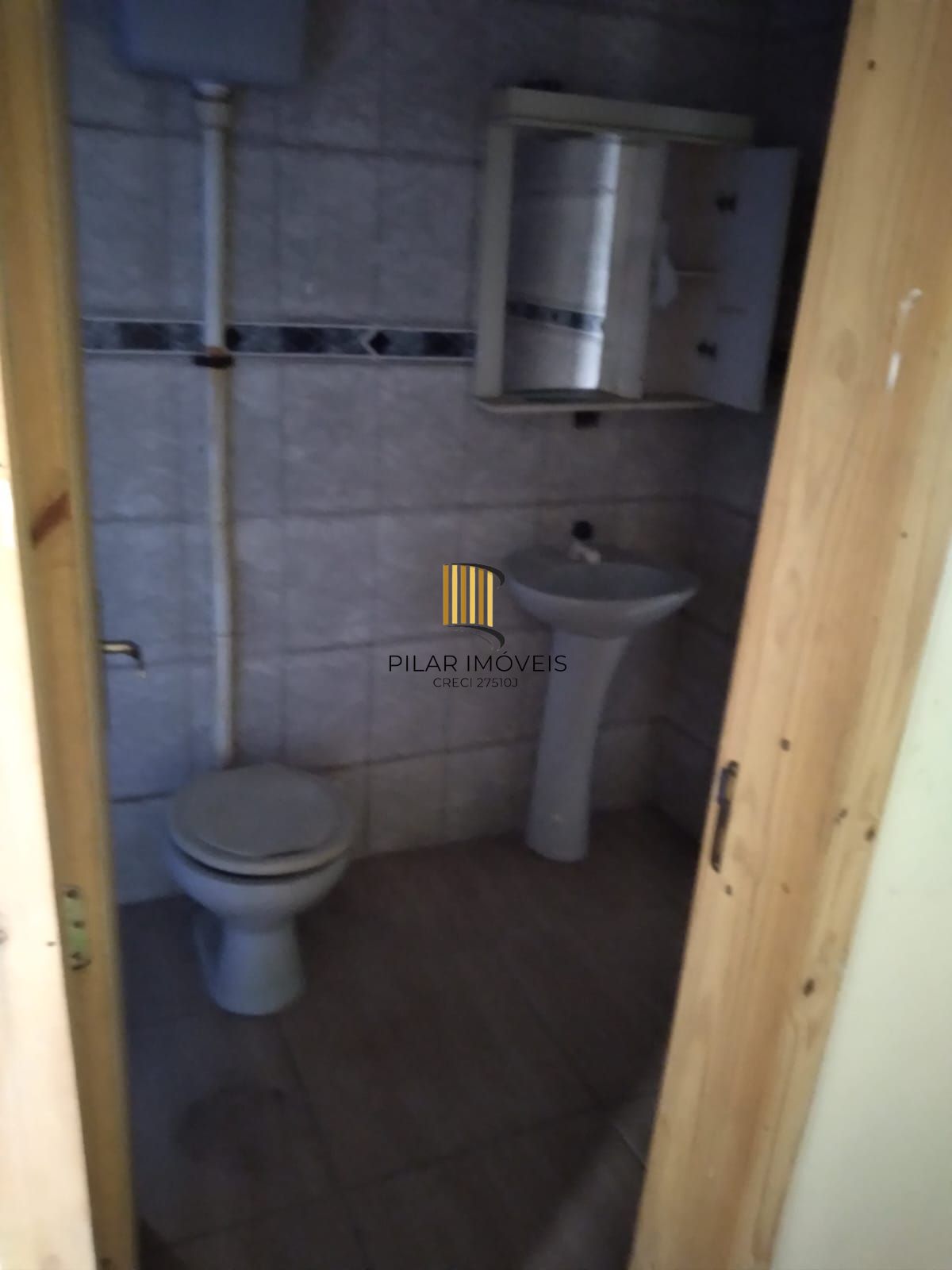 Casa com 2 dorm.  de  alvenaria em região arborizanada.