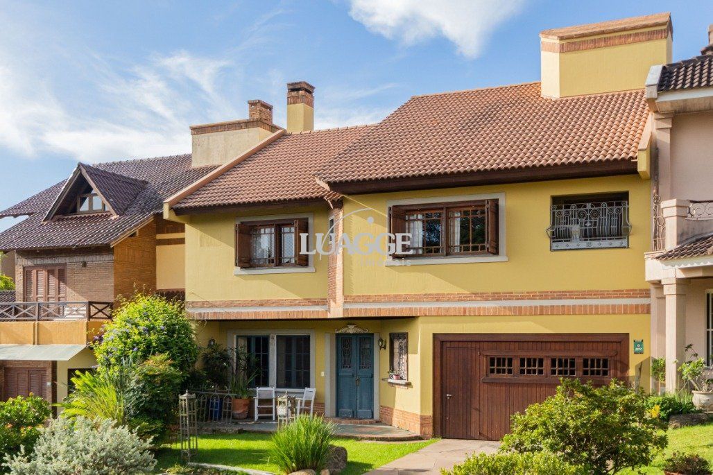 Casa à venda com 4 quartos, 342m² - Foto 1