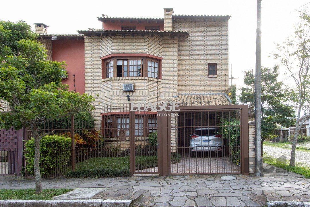 Casa à venda com 3 quartos, 182m² - Foto 1