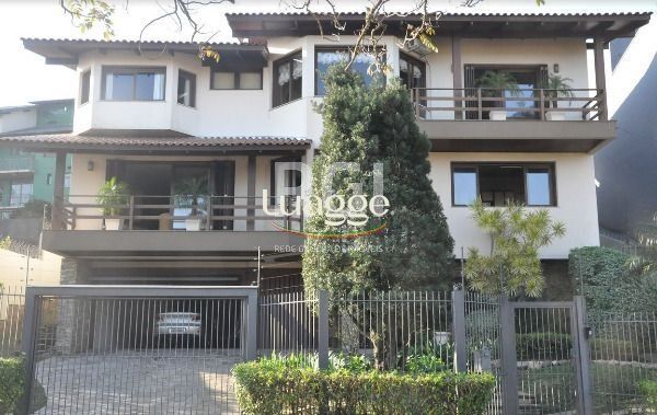 Casa à venda com 5 quartos, 408m² - Foto 1