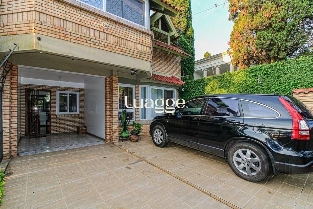 Casa à venda com 3 quartos, 179m² - Foto 1