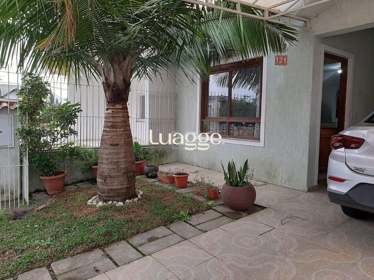 Casa à venda com 3 quartos, 119m² - Foto 1