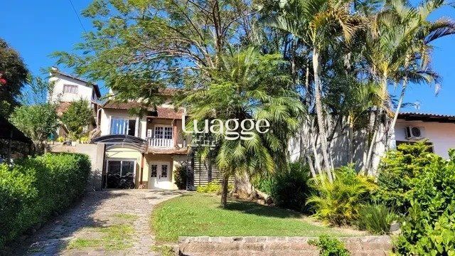 Casa à venda com 4 quartos, 247m² - Foto 2