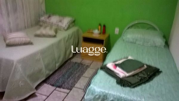 Casa à venda com 5 quartos, 142m² - Foto 6