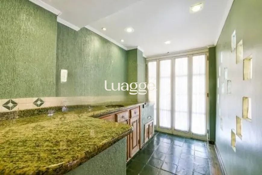 Casa à venda com 3 quartos, 229m² - Foto 5