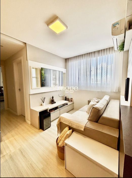 Apartamento à venda com 2 dormitórios, 48m², suíte e vaga de garagem.