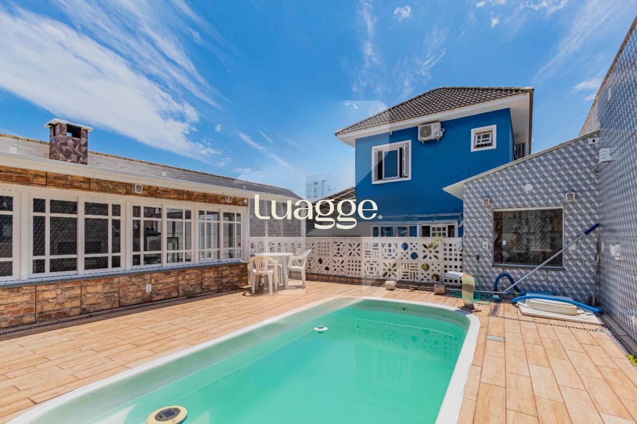 Casa à venda com 3 quartos, 127m² - Foto 1