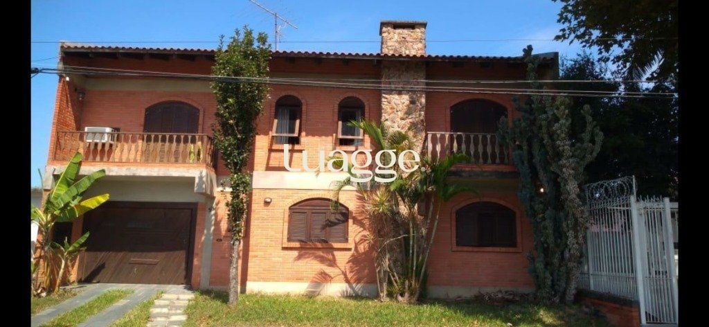 Casa à venda com 3 quartos, 328m² - Foto 1