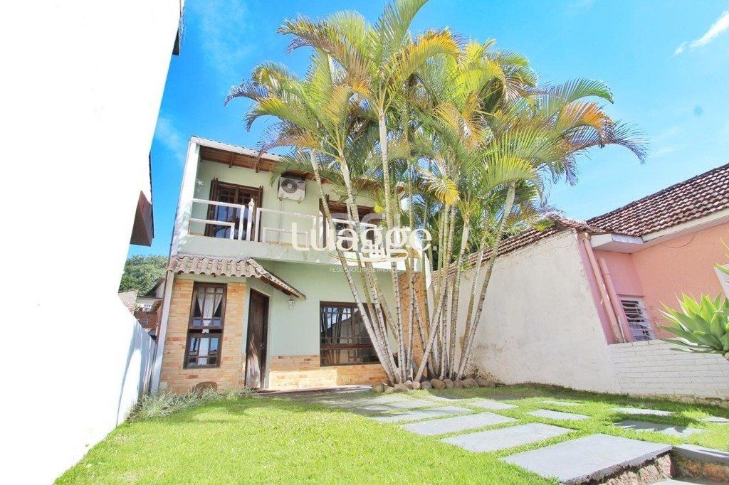 Casa à venda com 5 quartos, 262m² - Foto 1