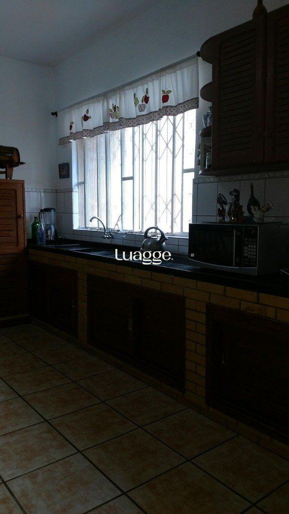 Casa à venda com 3 quartos, 411m² - Foto 7