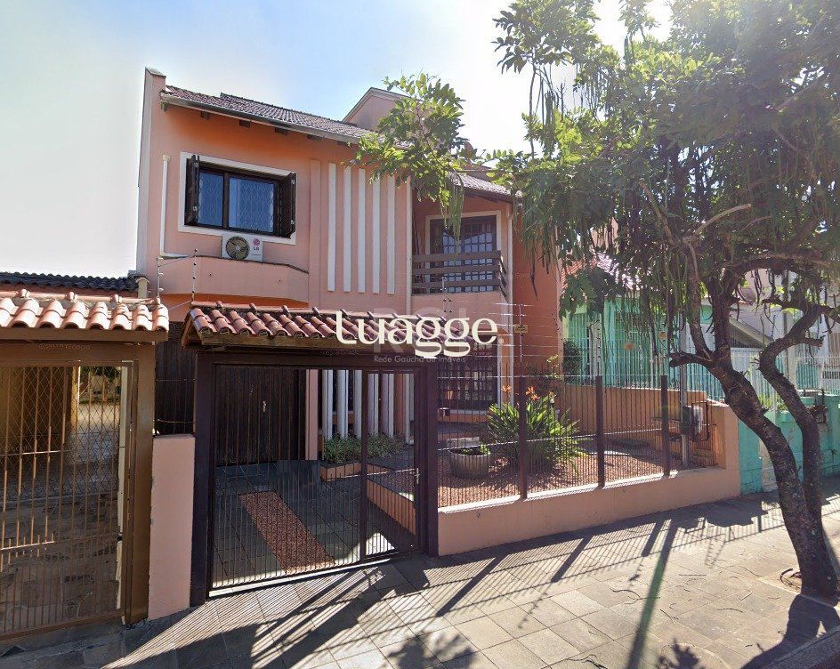 Casa à venda com 3 quartos, 318m² - Foto 1
