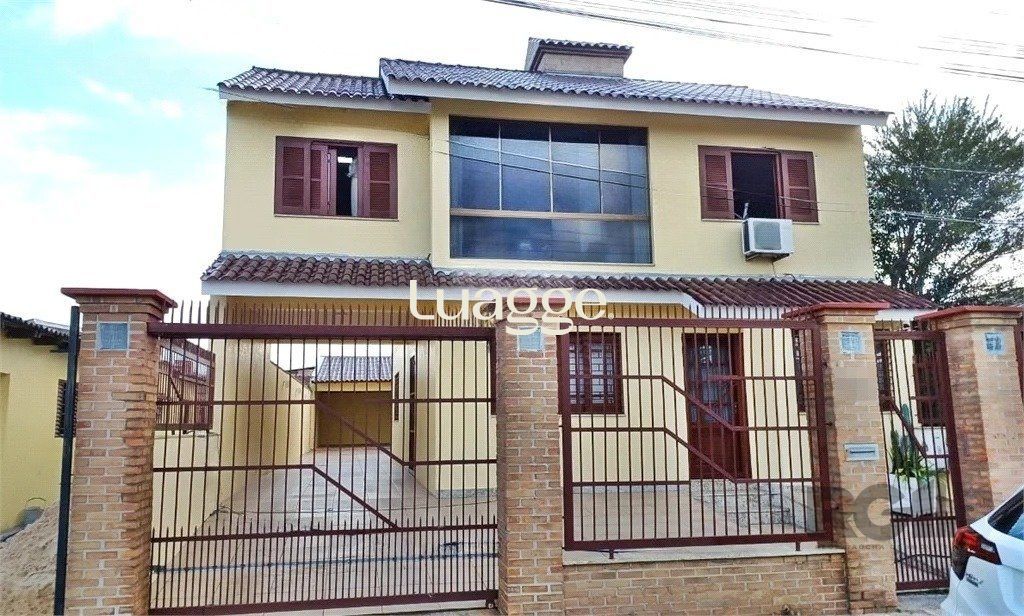 Casa à venda com 3 quartos, 239m² - Foto 1
