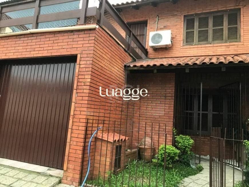 Casa à venda com 3 quartos, 145m² - Foto 1