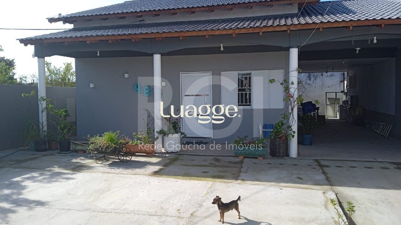 Casa à venda com 3 quartos, 89m² - Foto 1