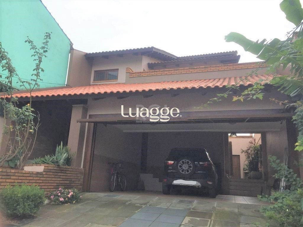 Casa à venda com 3 quartos, 271m² - Foto 1