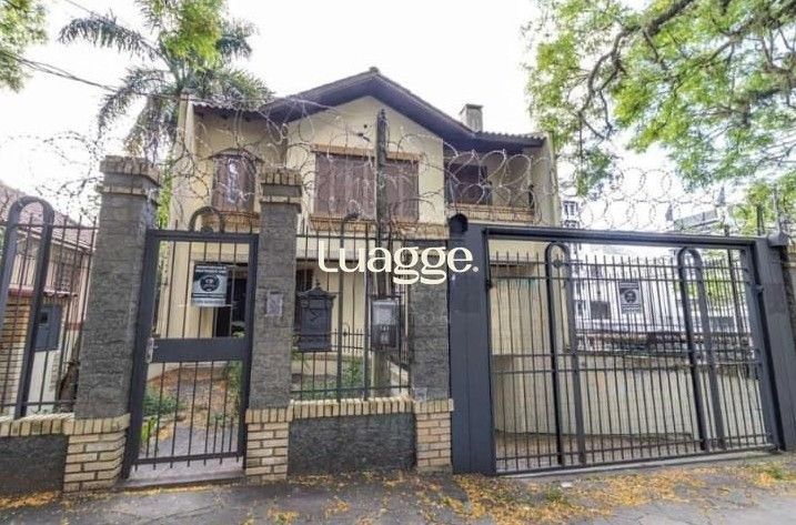 Casa com 4 dormitórios para alugar no bairro Menino Deus