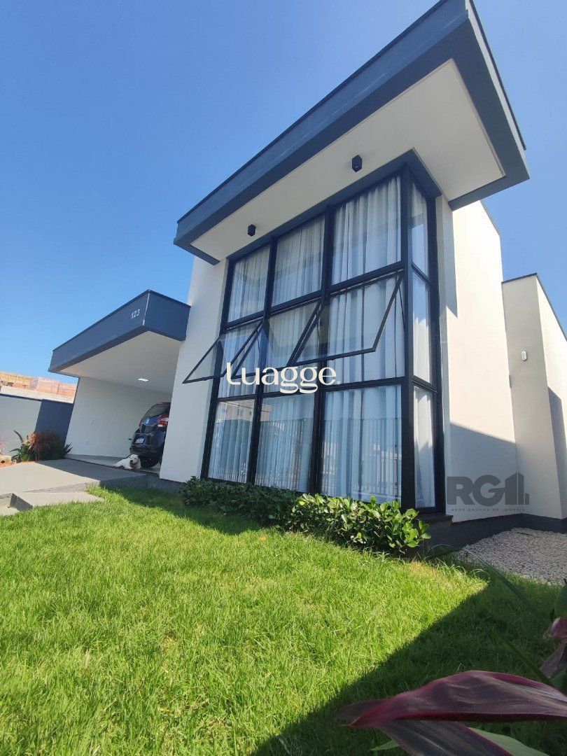 Casa à venda com 3 quartos, 128m² - Foto 1