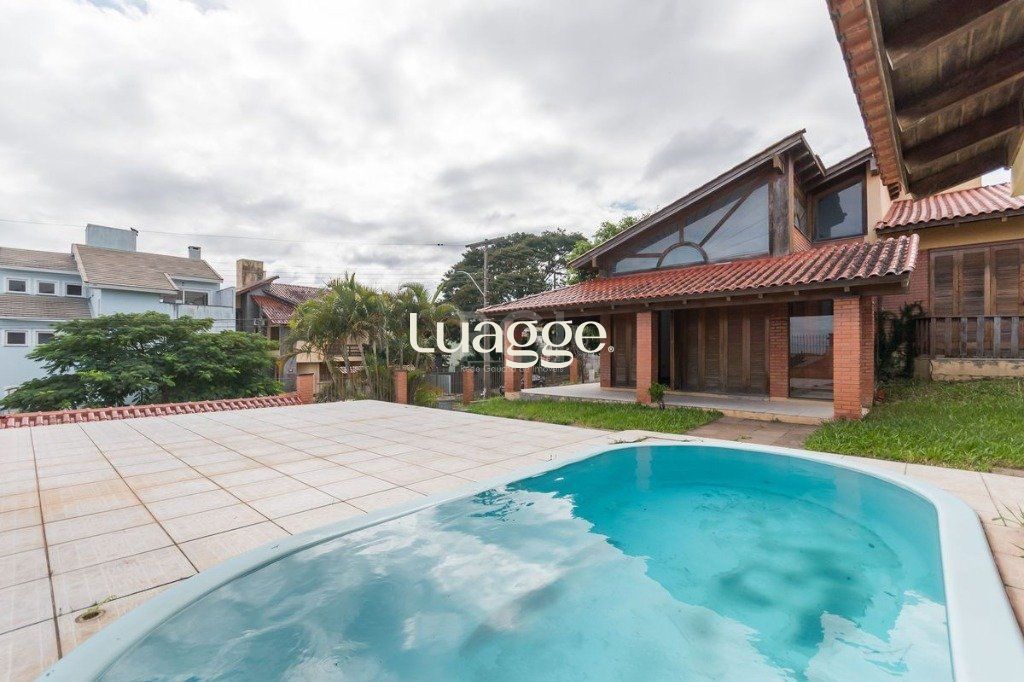 Casa à venda com 3 quartos, 303m² - Foto 2