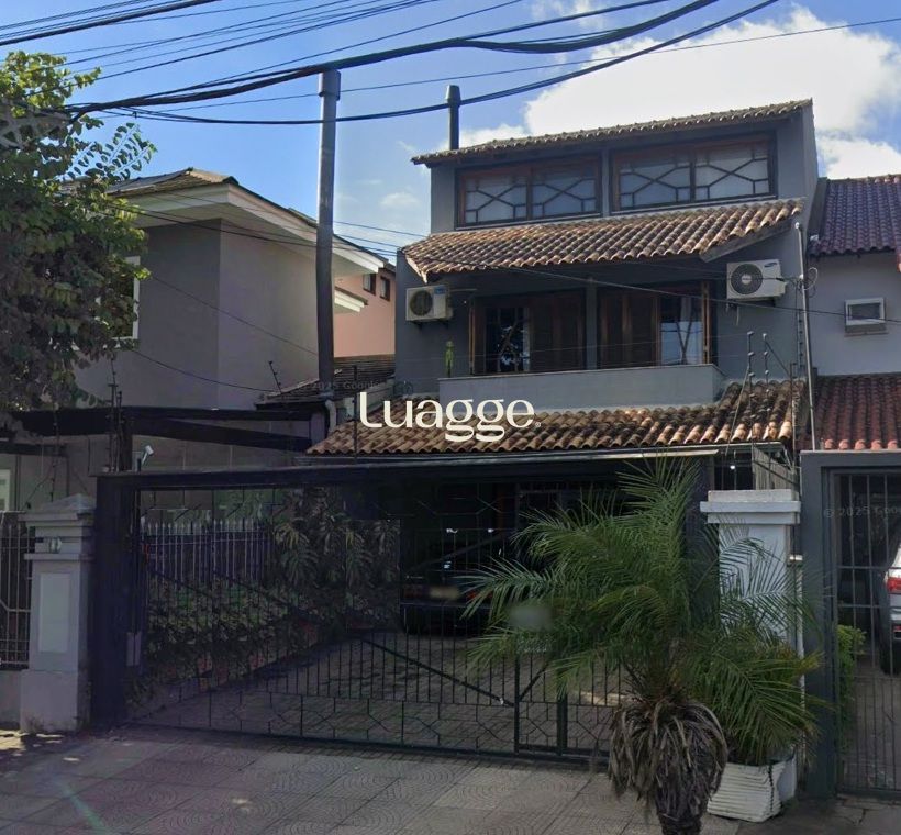 Casa à venda com 3 quartos, 219m² - Foto 1