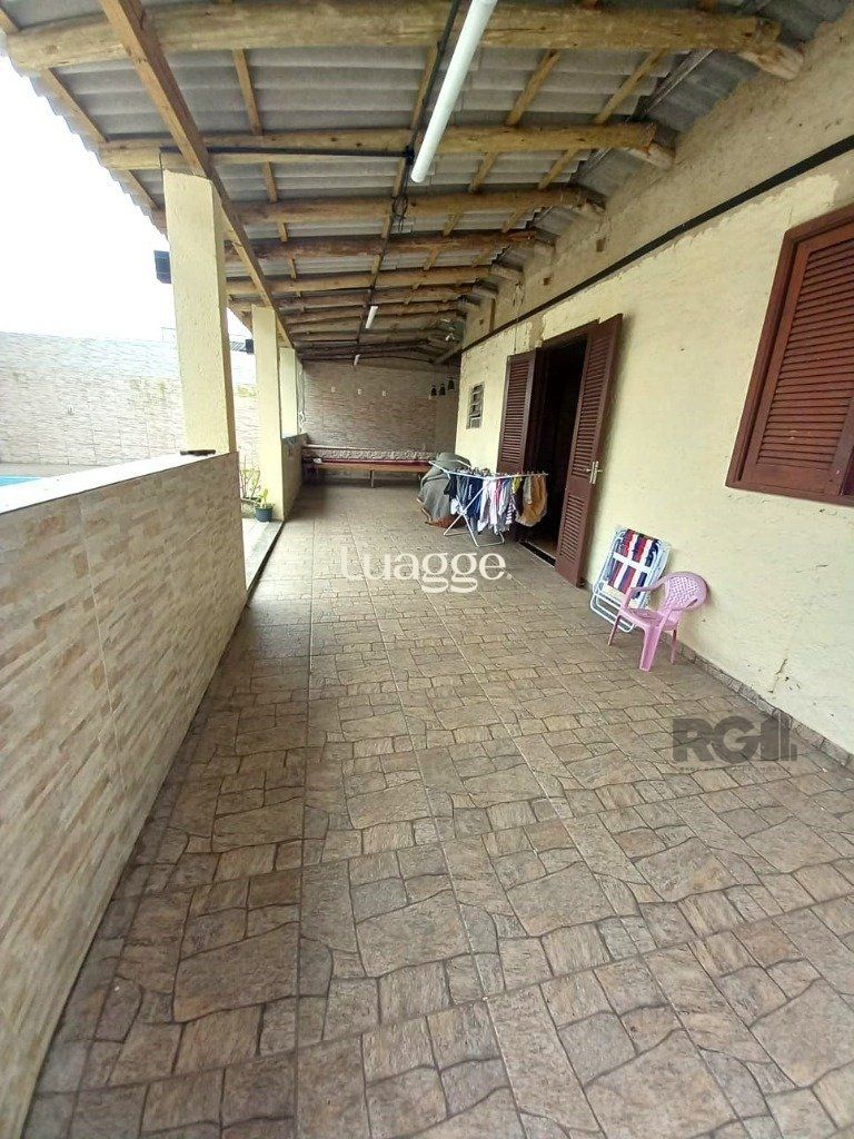 Casa à venda com 3 quartos, 89m² - Foto 1