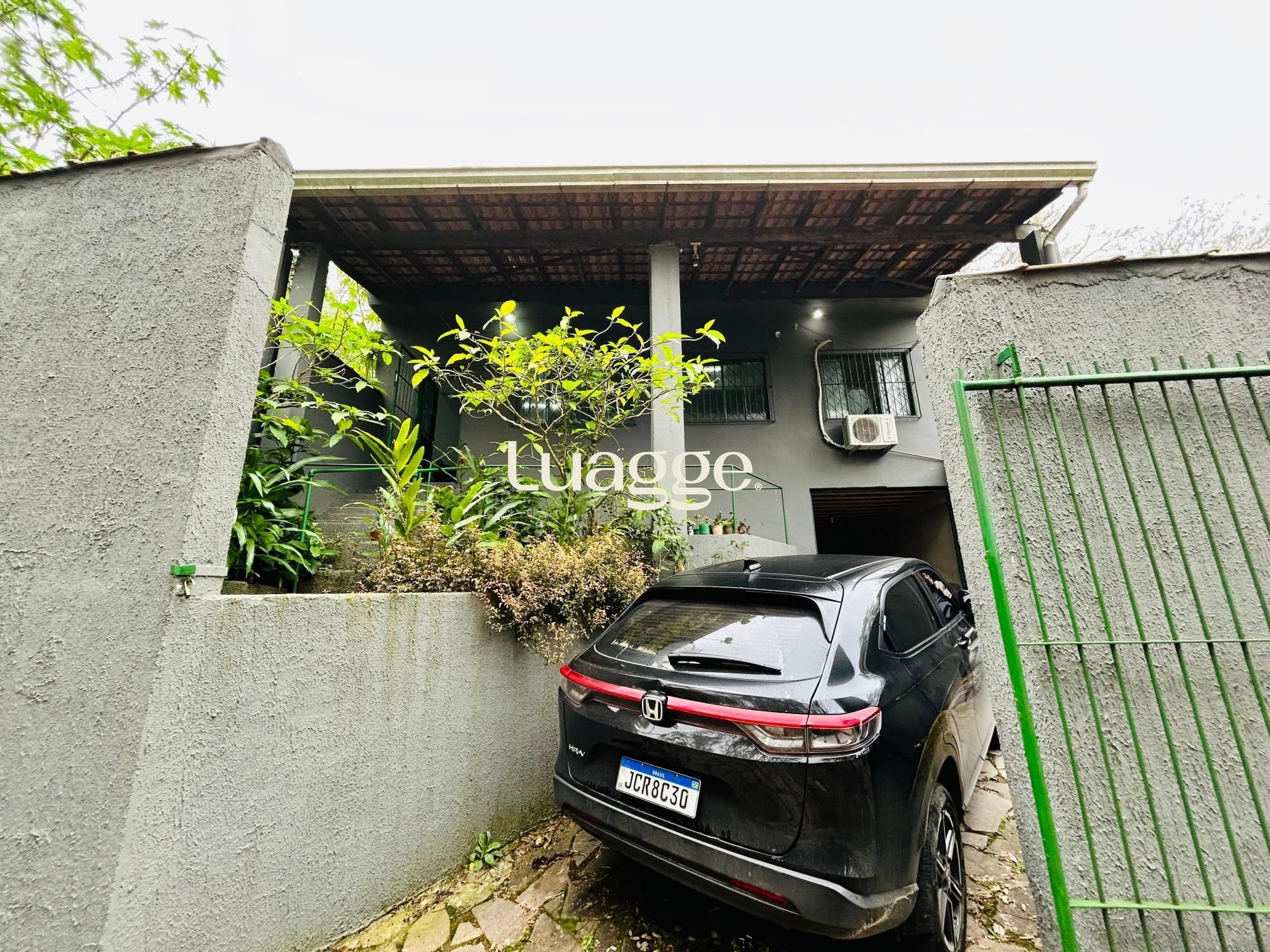 Casa de 2 dormitórios com duas vagas no Bairro Lomba do Pinheiro