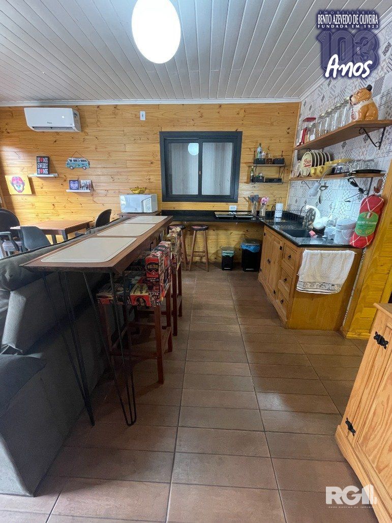 Sala integrada a cozinha casa 1