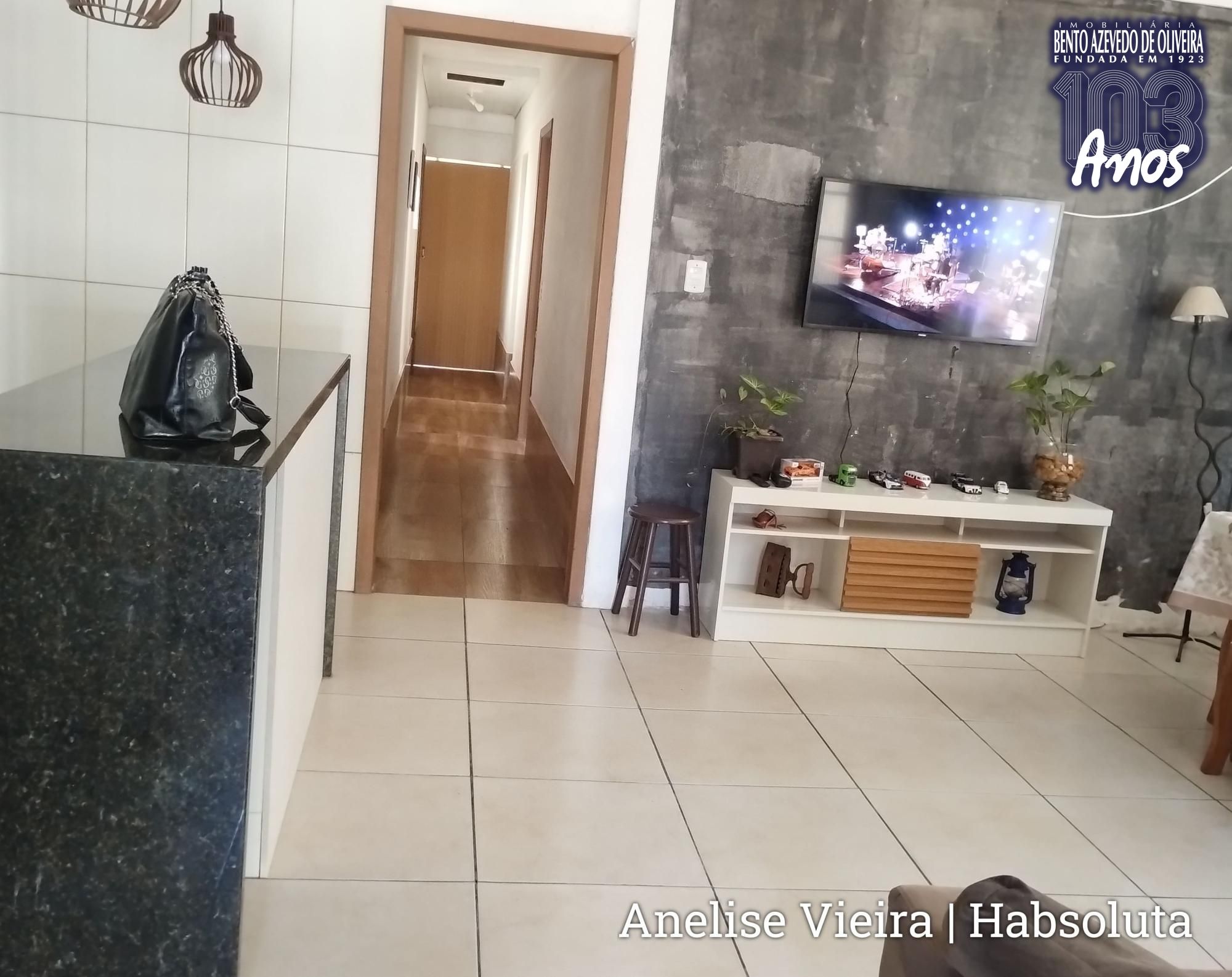 Espaço integrado conectando harmoniosamente a cozinha e a sala de jantar