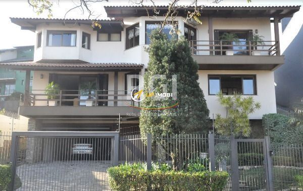 Casa com 408m², 5 dormitórios no bairro Teresópolis em Porto Alegre para Comprar
