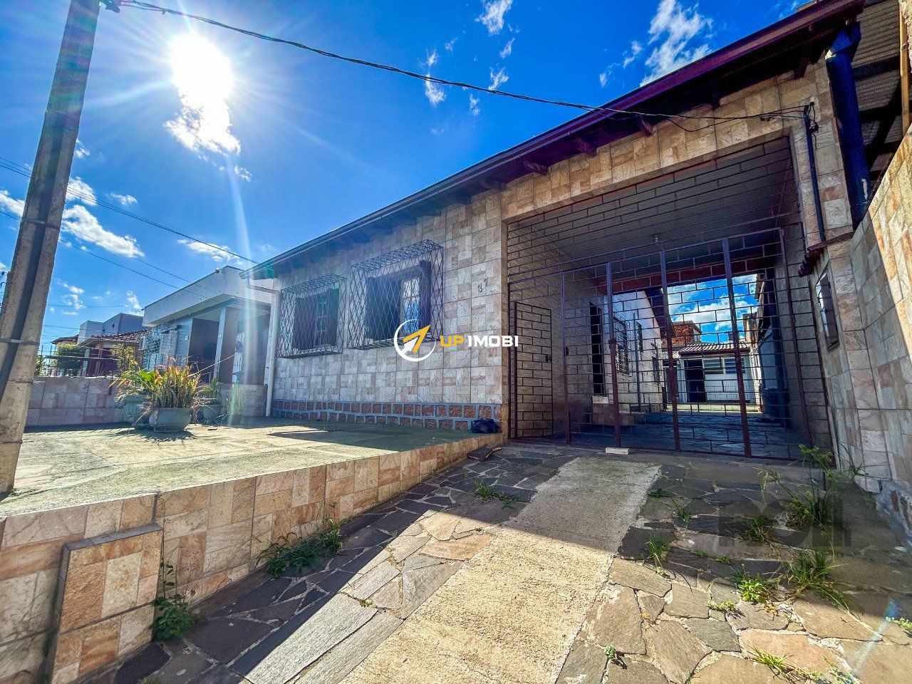 Casa com 114m², 3 dormitórios no bairro Cavalhada em Porto Alegre para Comprar