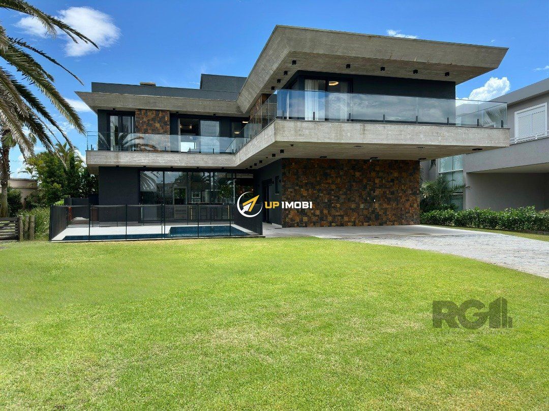 Casa de Condomínio com 400m², 4 dormitórios no bairro Centro em Xangri-Lá para Comprar