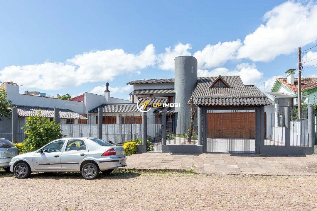 Casa com 451m², 5 dormitórios no bairro Nonoai em Porto Alegre para Comprar