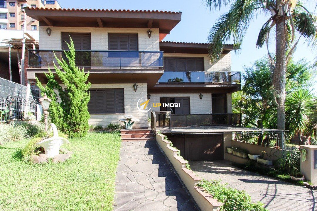 Casa com 475m², 4 dormitórios no bairro Tristeza em Porto Alegre para Comprar